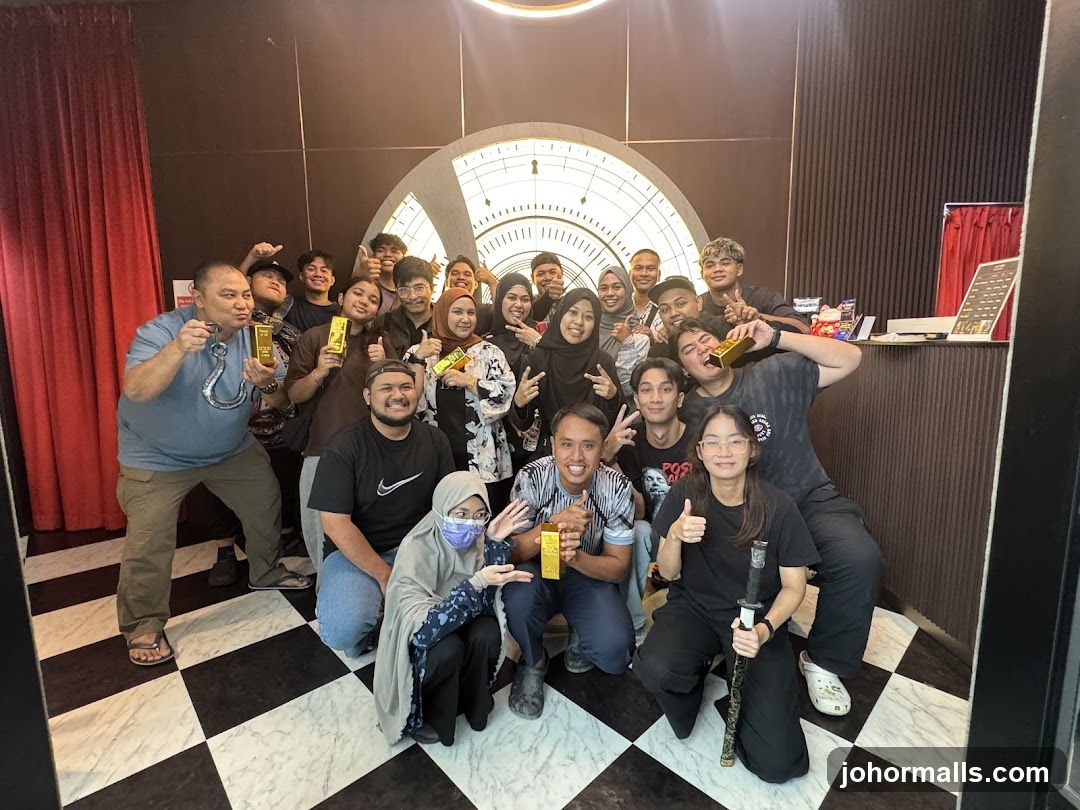 Group Posing with Gold Bars