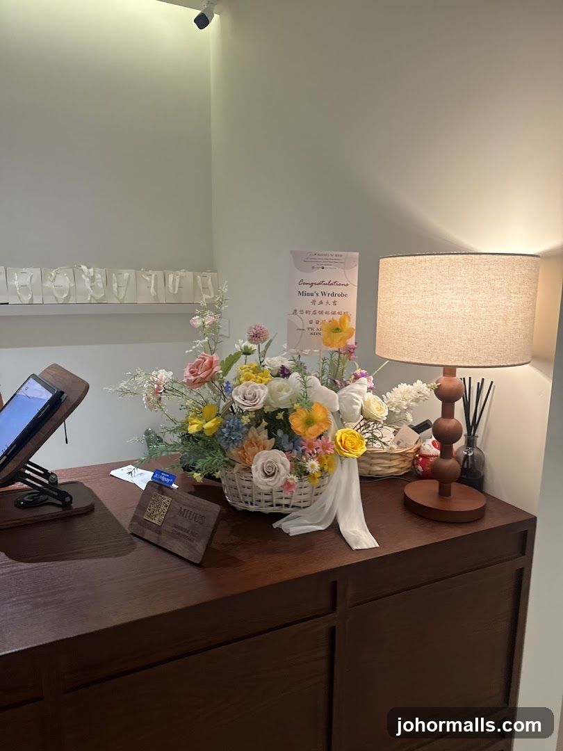 Counter Display with Flowers and Signage