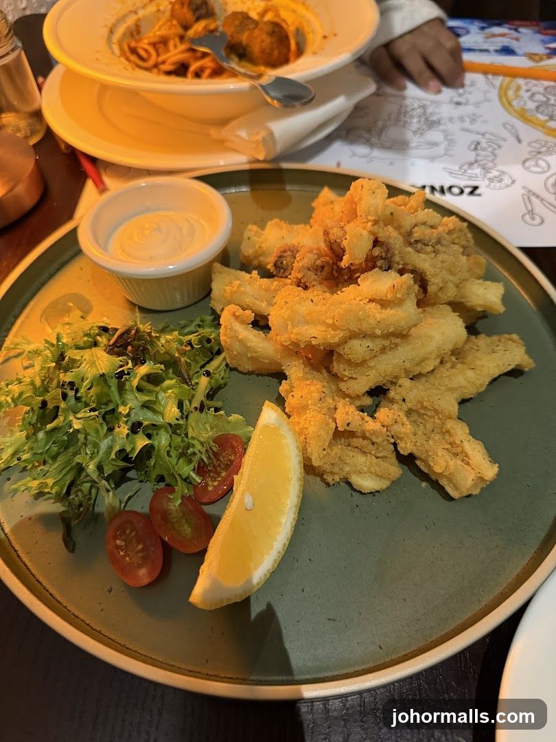 Fried Calamari with Salad and Lemon