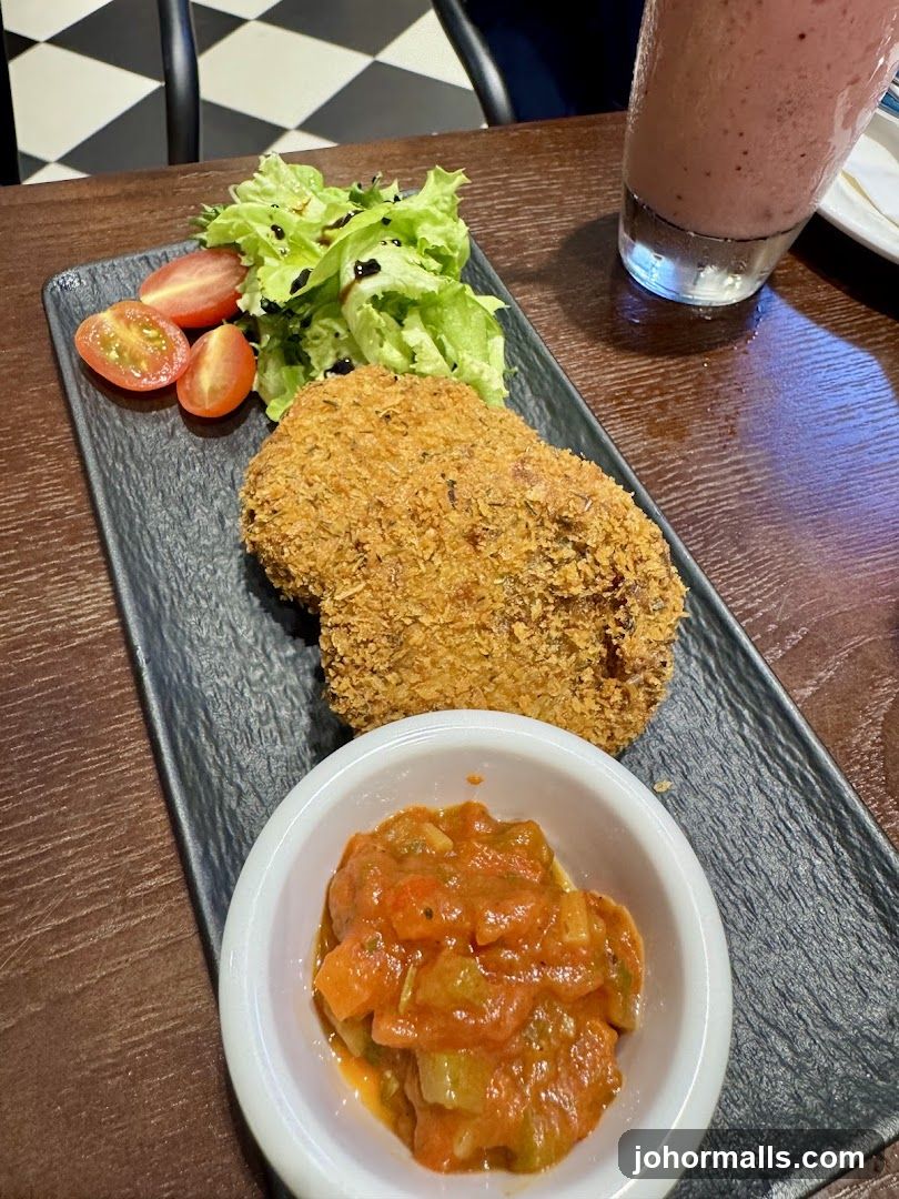 Fried Cutlet with Salad and Sauce