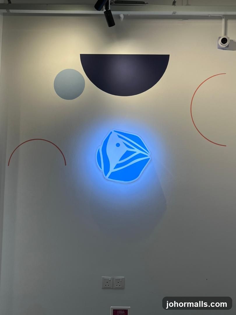 Illuminated Logo on Wall