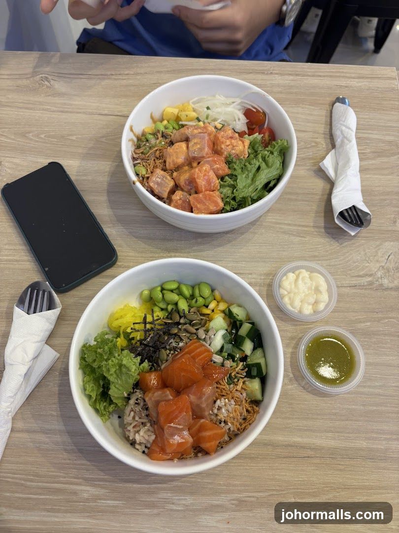 Two poke bowls on a table