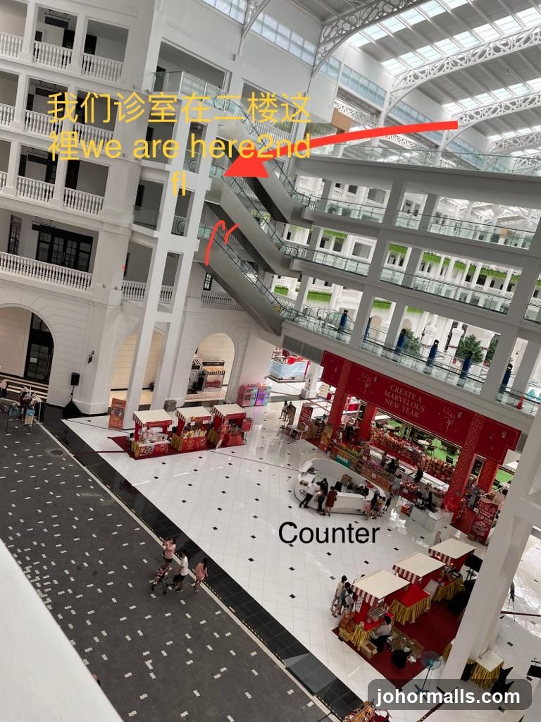 Indoor shopping mall with escalators and stalls