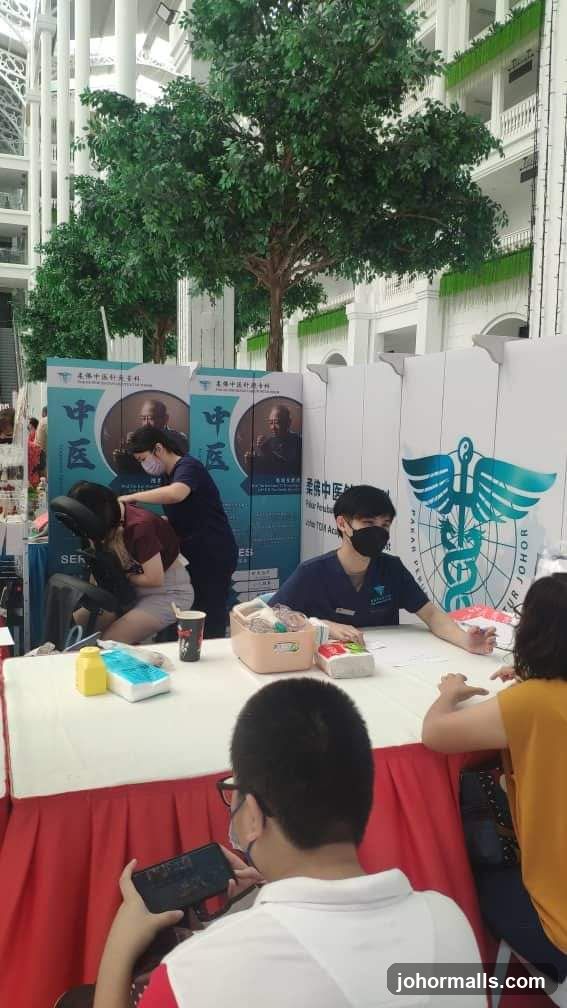TCM Booth with Massage Services