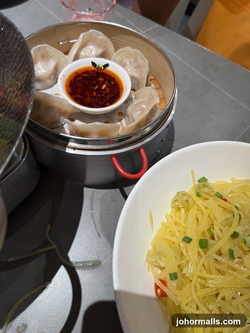 Steamed Dumplings and Shredded Potato Salad