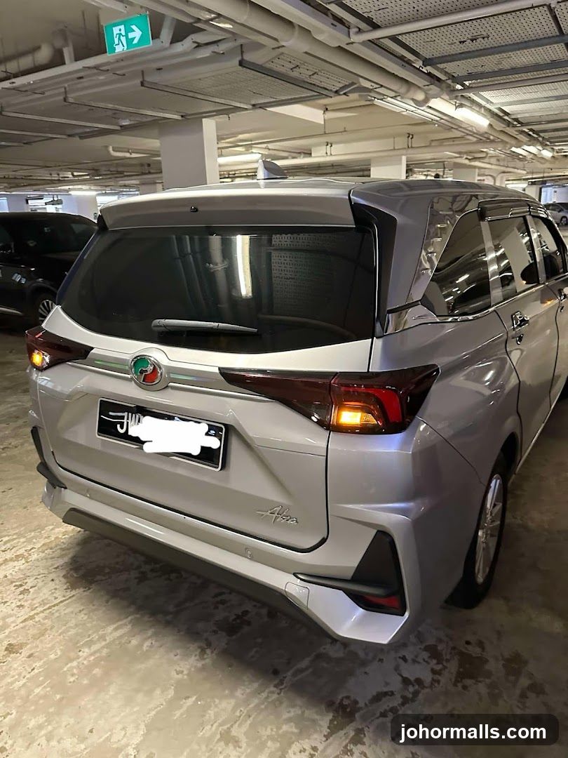 Silver Car in Parking Garage