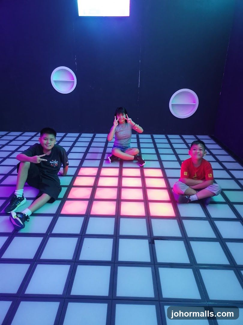 Children Posing on a Light-Up Dance Floor