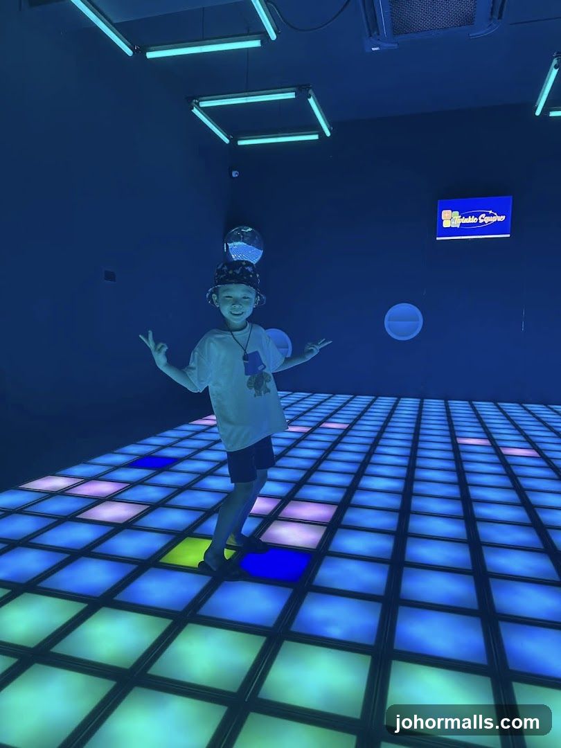 Child on a light-up dance floor