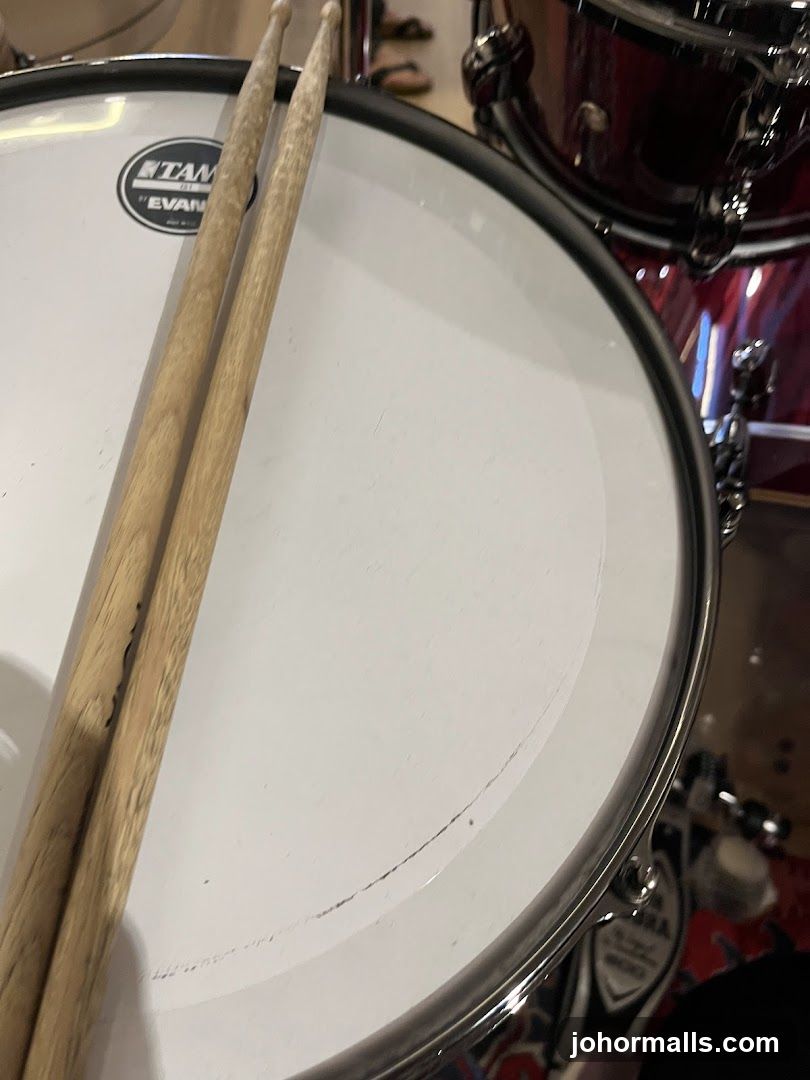 Drumsticks on a Snare Drum