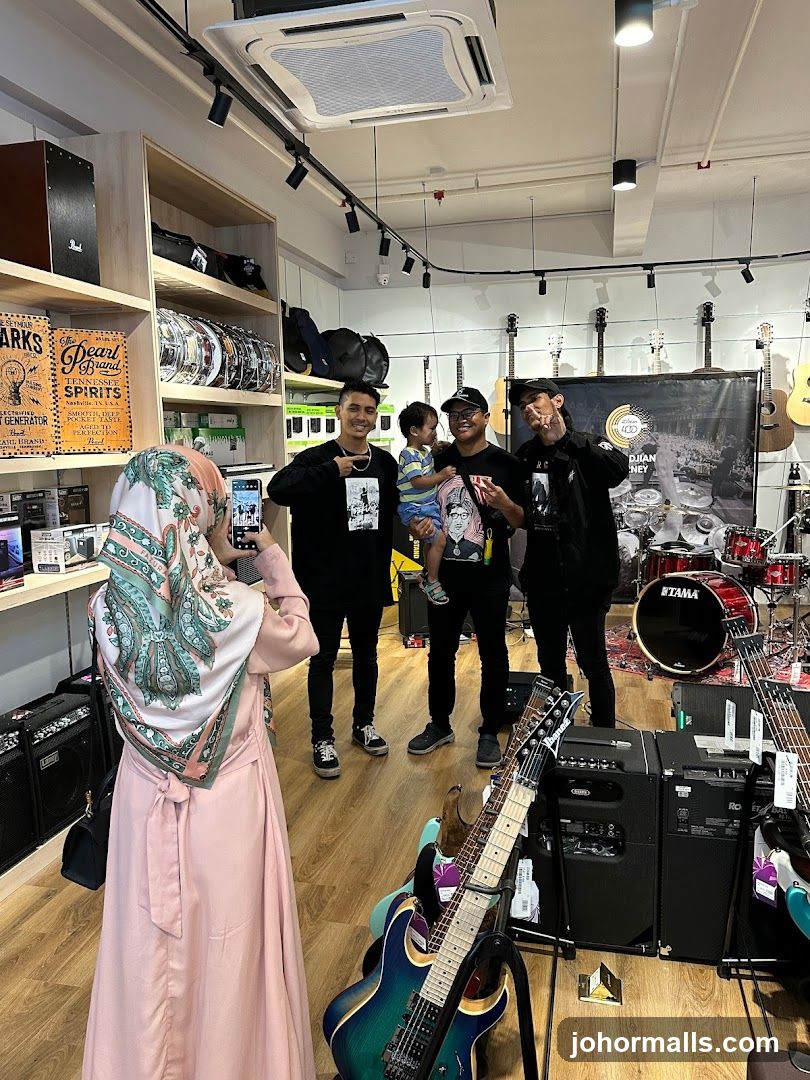 People posing in a music store
