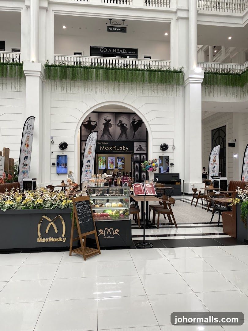 Cafe with pastries and fruit display