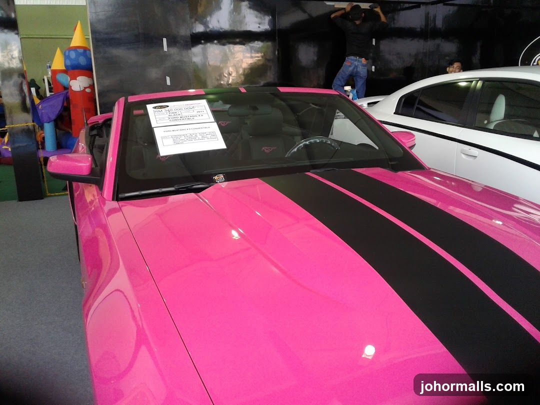 Pink Ford Mustang Convertible with Black Stripes