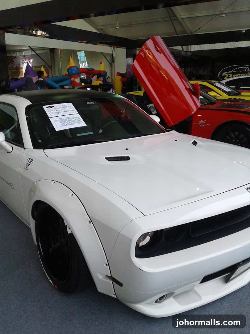 White Dodge Challenger with Scissor Doors