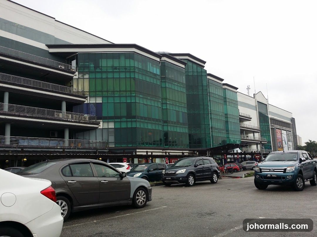 Modern Building Facade with Parking Lot