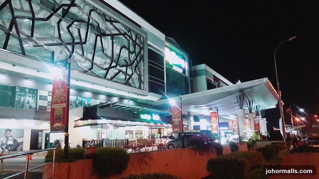 Night view of a modern shopping mall entrance