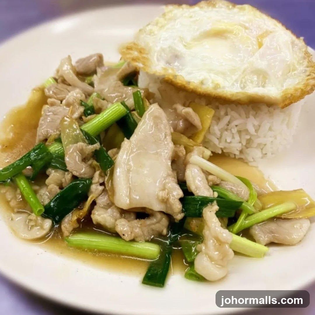 Stir-fried Pork with Ginger and Scallions with Fried Egg