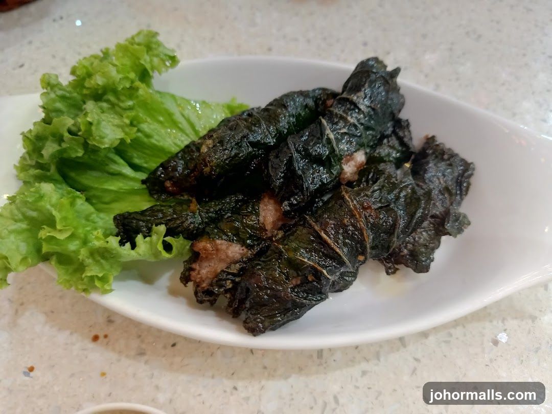 Leaf-wrapped meat dish