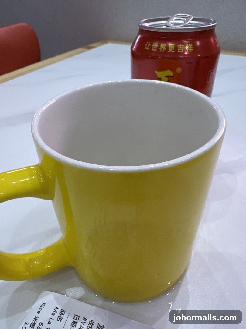 Yellow Mug and Red Can