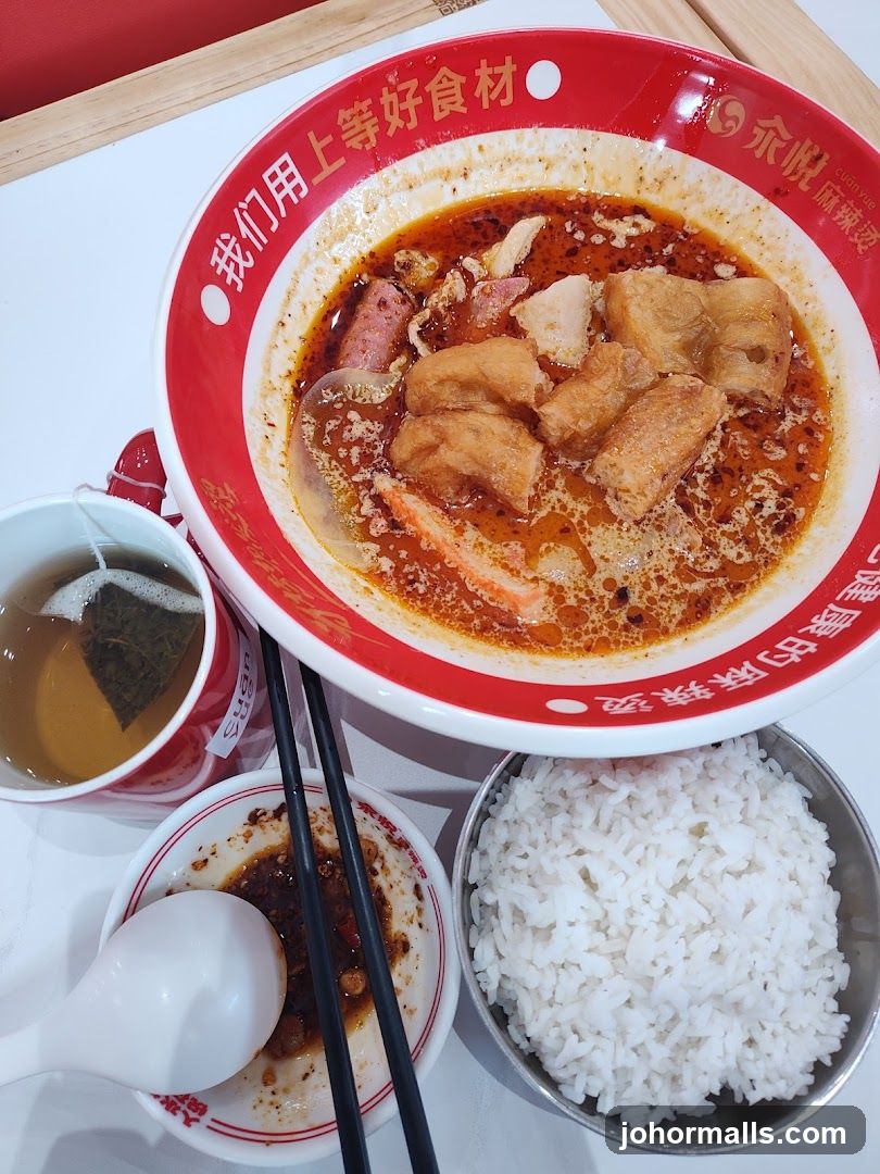 Spicy Noodle Soup with Rice and Tea