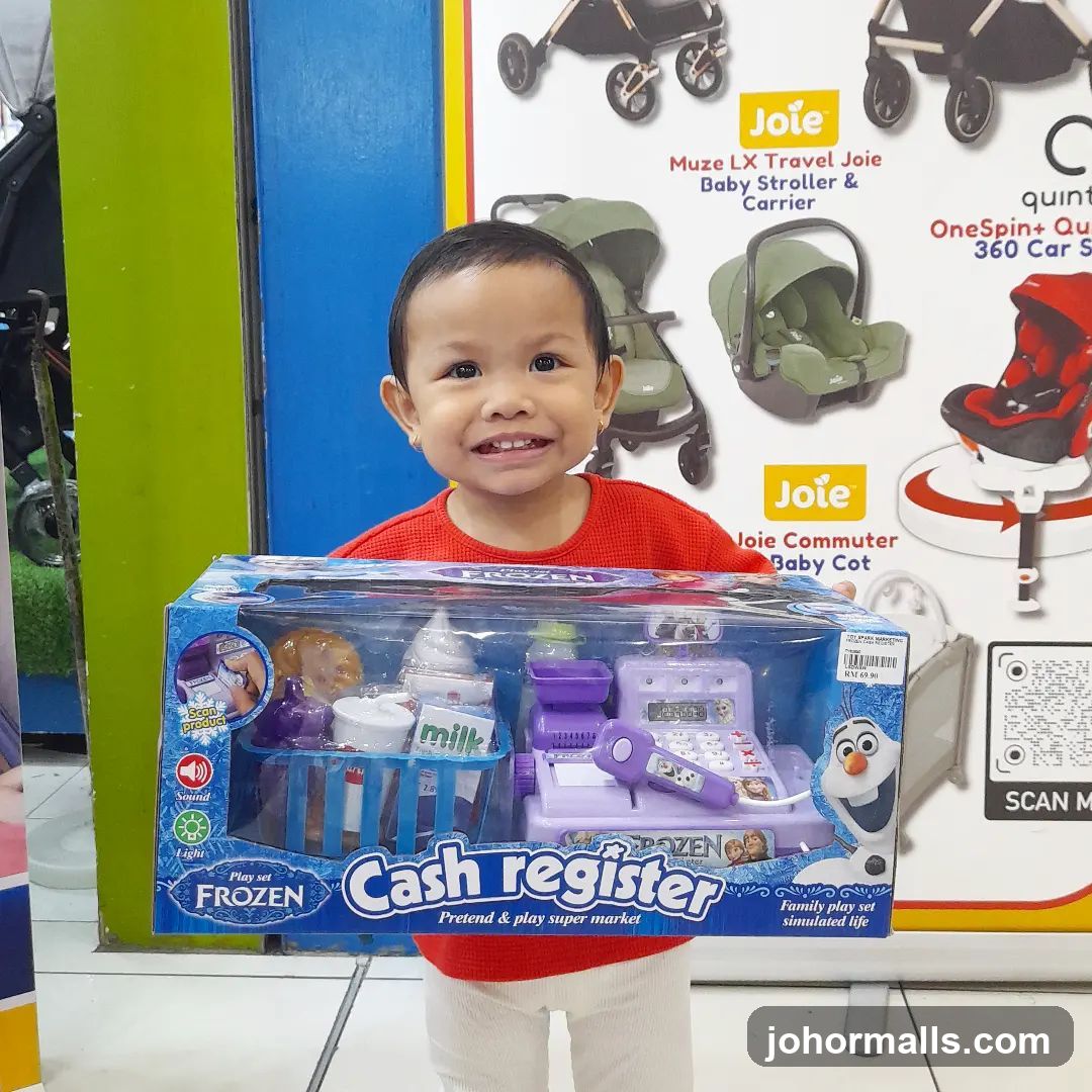 Child with Frozen Cash Register Toy