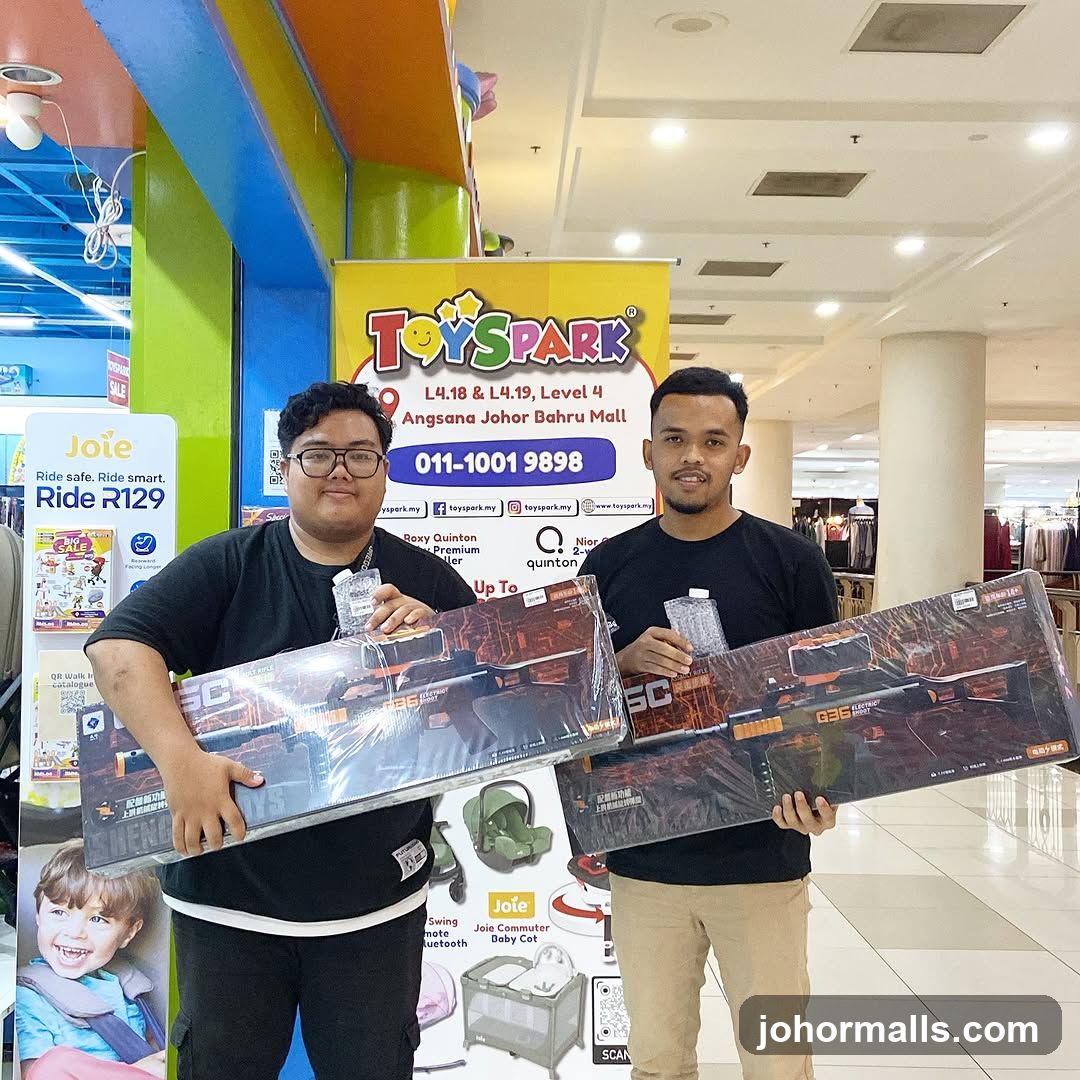 Two men holding toy guns