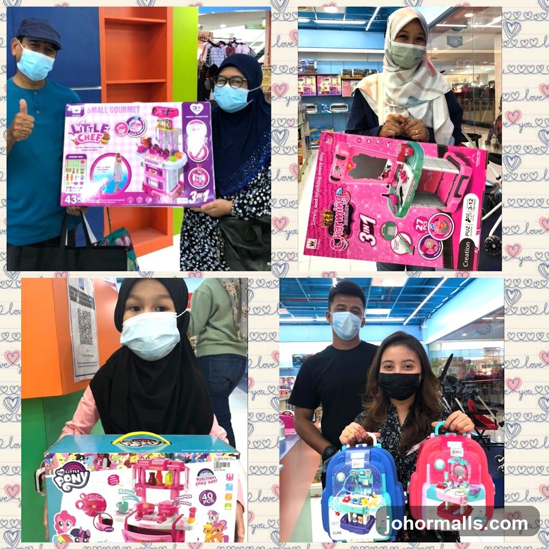 People holding toy kitchen sets