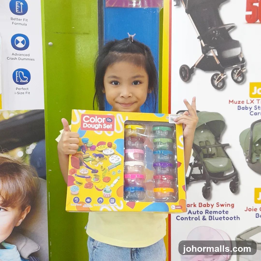 Girl Holding a Dough Set
