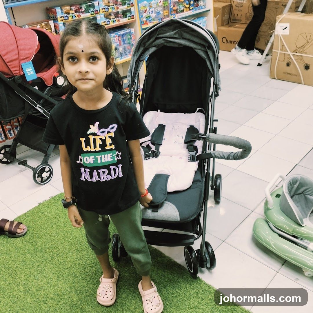 Young girl in a store with strollers