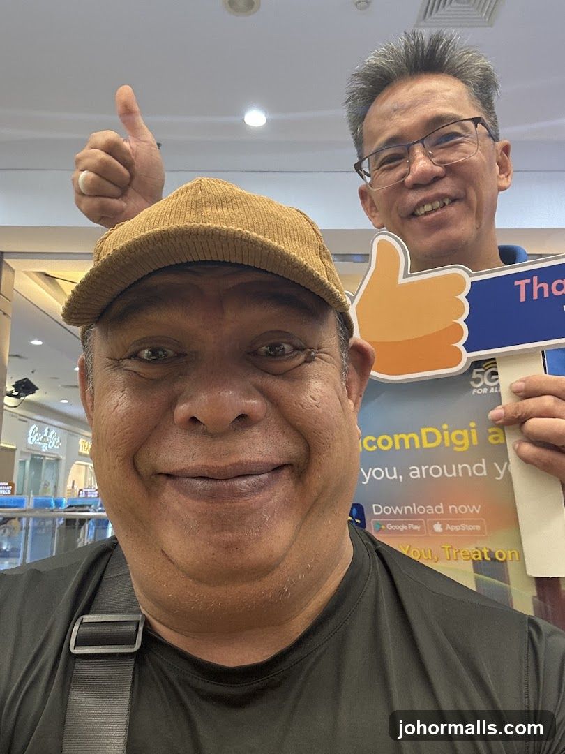 Two men posing for a selfie