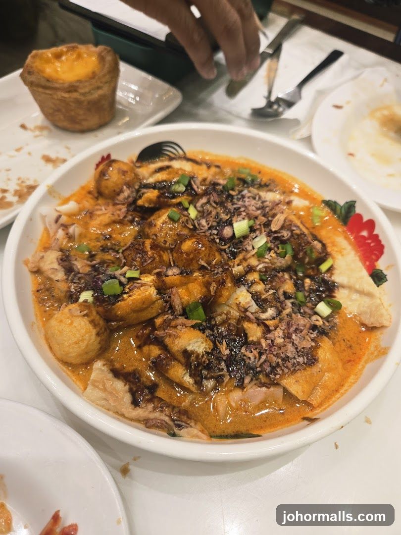 Noodle Dish and Egg Tart