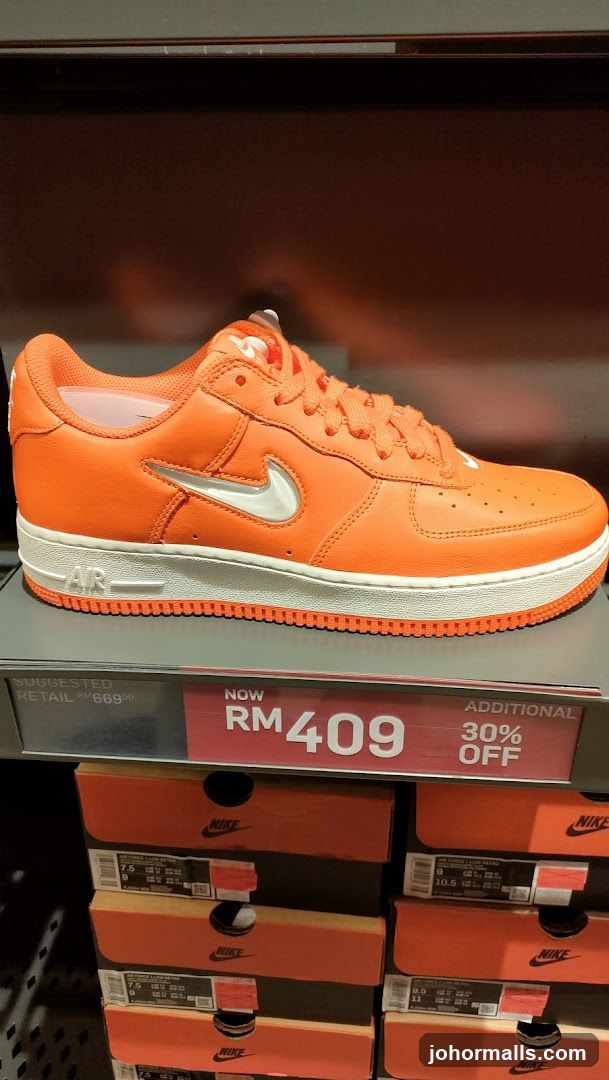 Orange Nike Air Force 1 Sneakers on Display