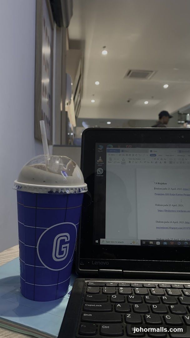 Beverage and Laptop