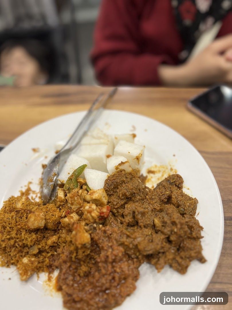 Plate of Food with People in Background