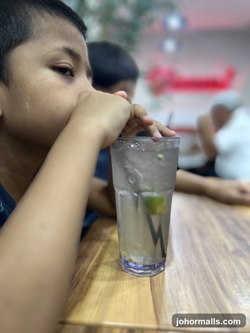 Boy drinking from a glass