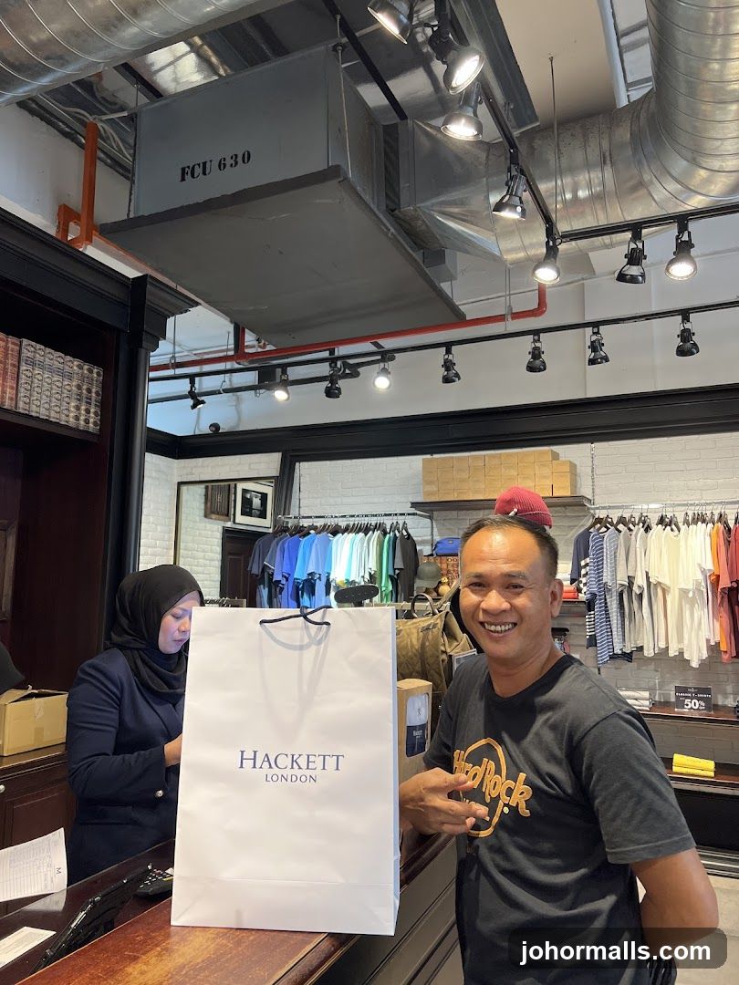 Man and Shopping Bag in Store