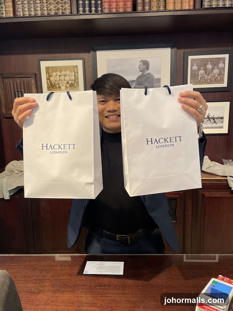 Man holding shopping bags