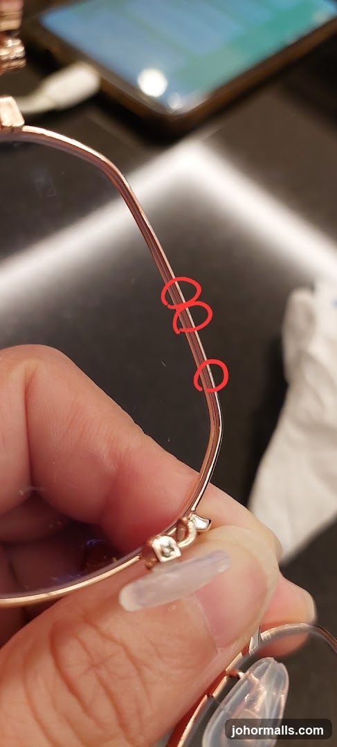 Close-up of Eyeglasses with Red Circles
