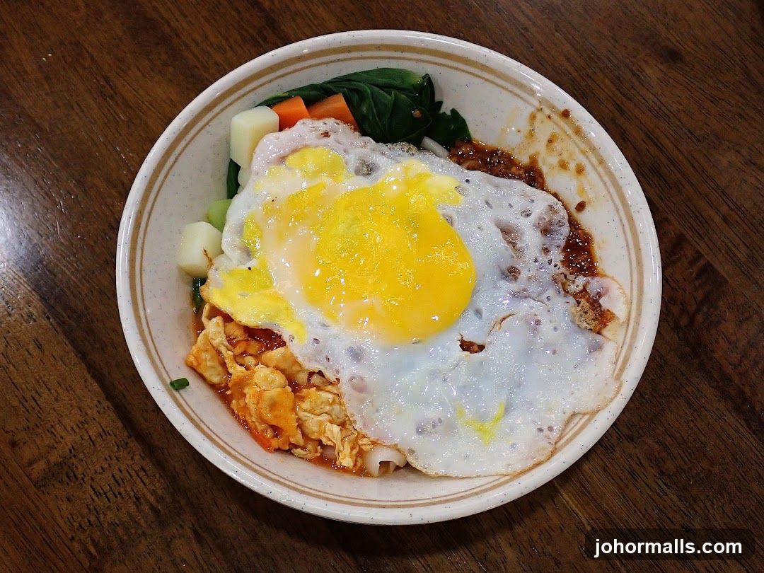 Noodle Dish with Fried Egg