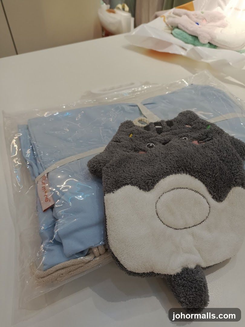 Cat-shaped wash mitt and blue fabric item