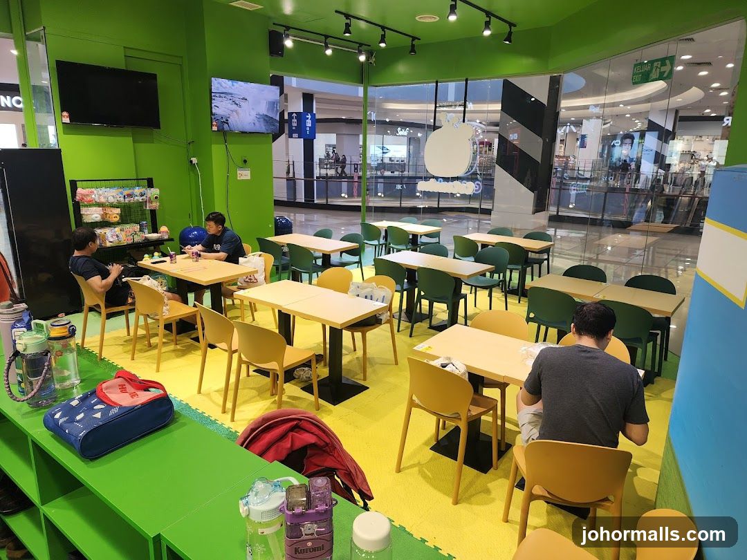 Diners in a brightly lit cafe