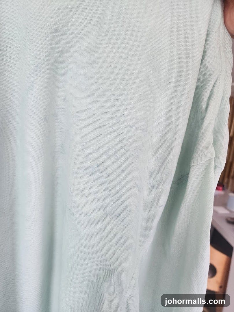 Light Blue Fabric with Stains
