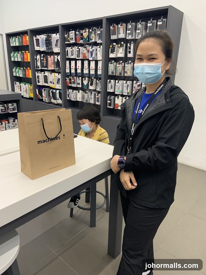 Store Employee and Child with Shopping Bag