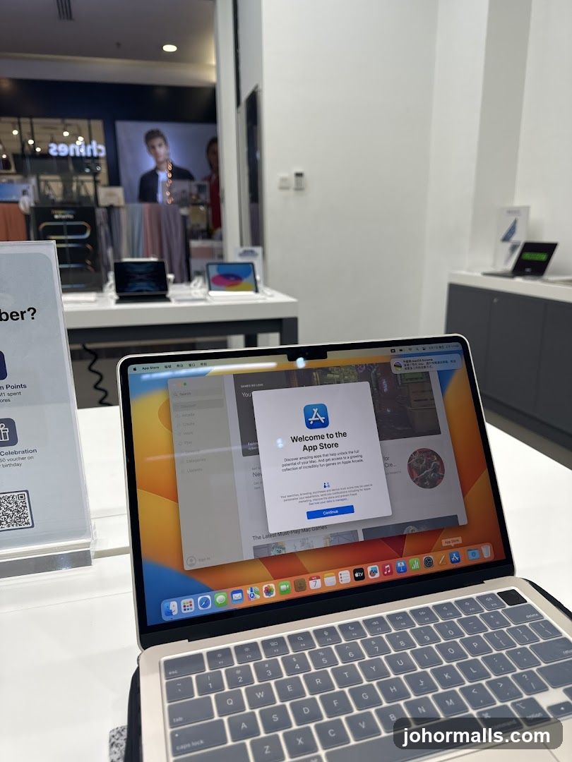 Laptop displaying App Store welcome screen