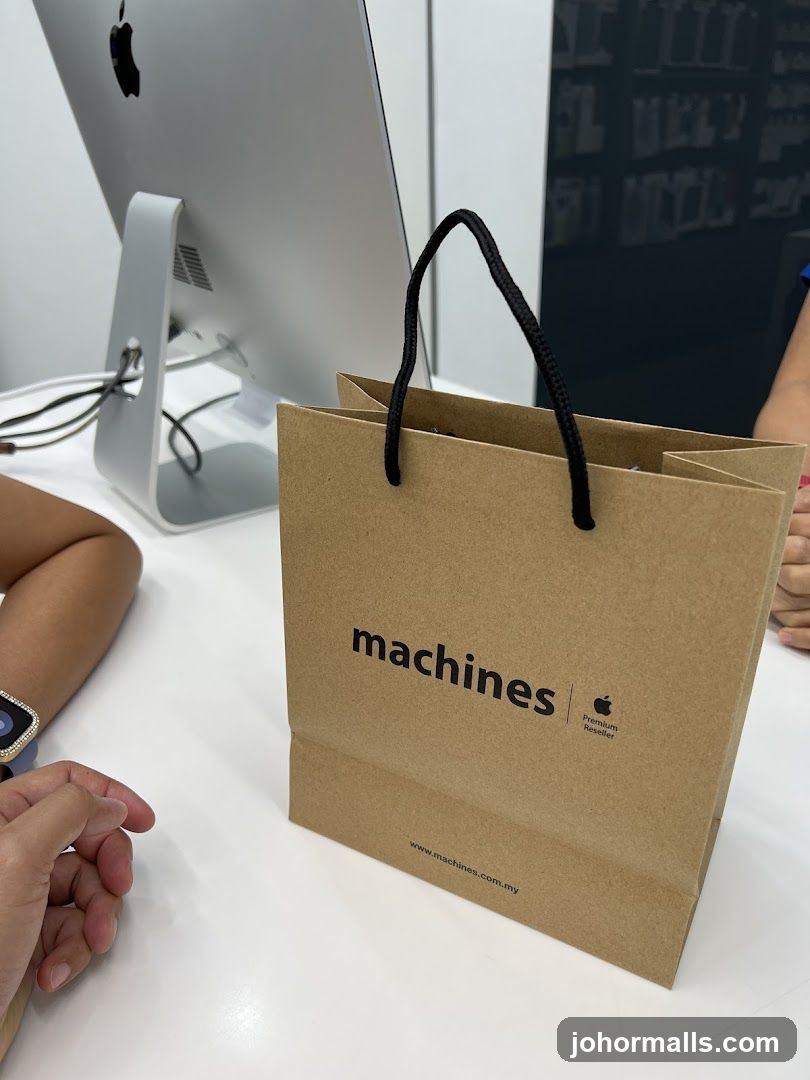 Brown paper shopping bag with Apple logo