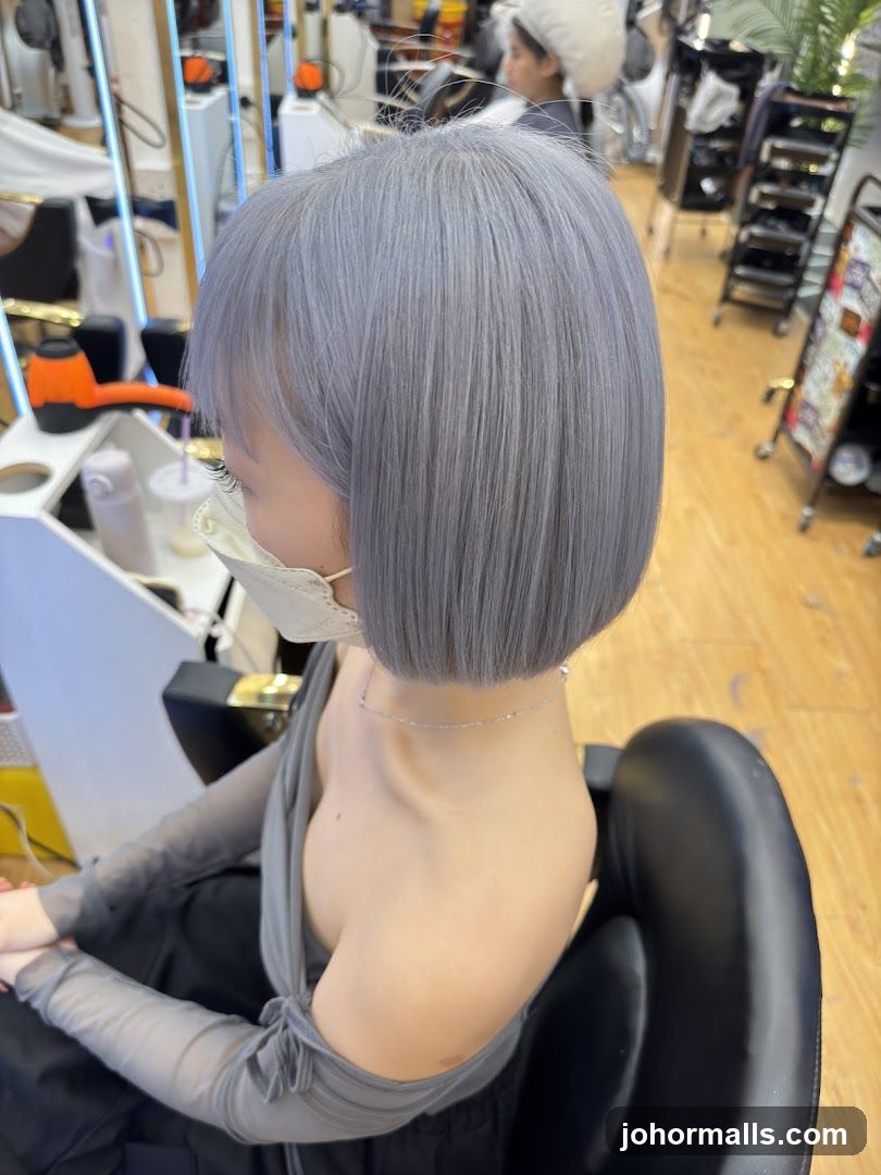 Woman with gray bob haircut