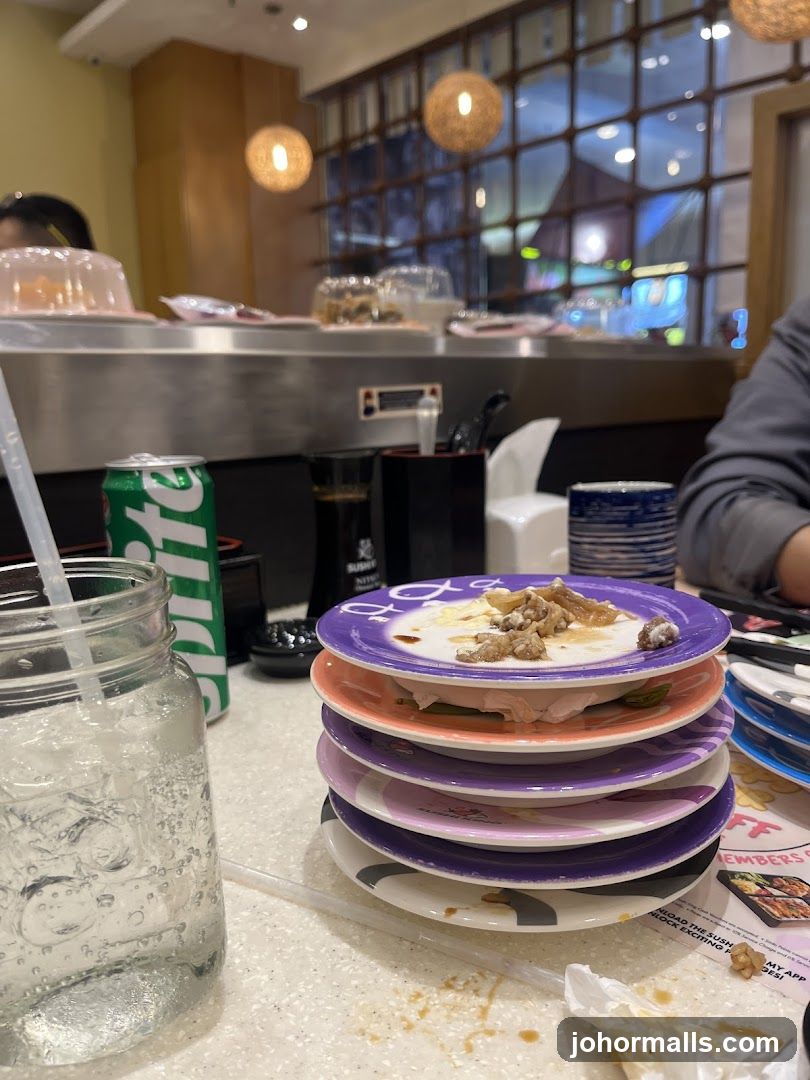 Table with Sushi Plates and Drink