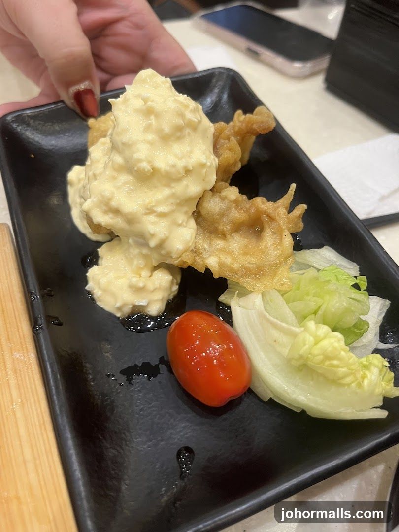Fried Food with Sauce and Garnish