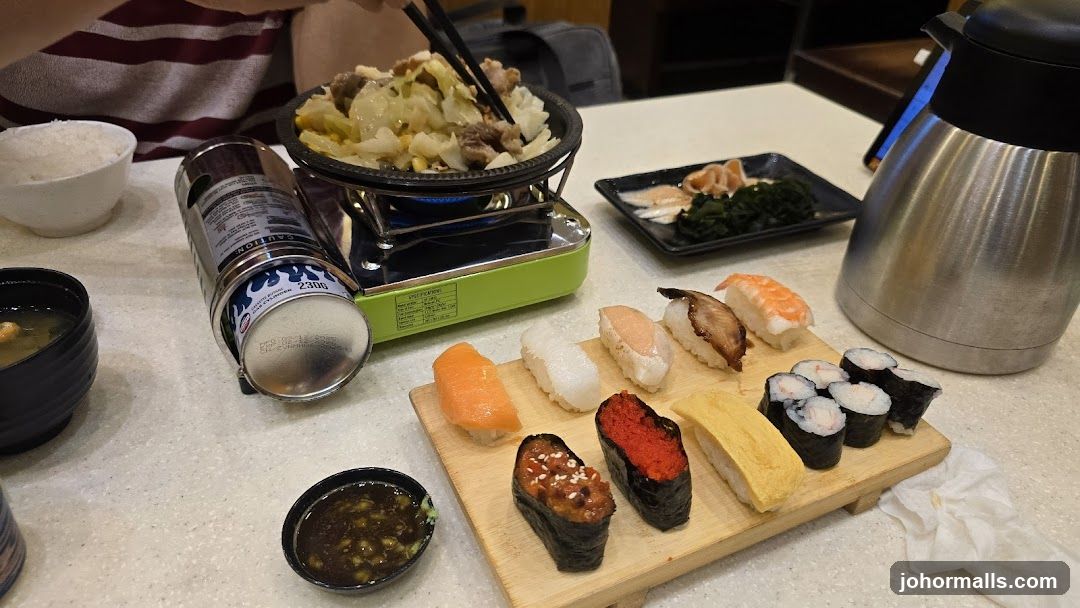 Table with Sushi and Hot Pot