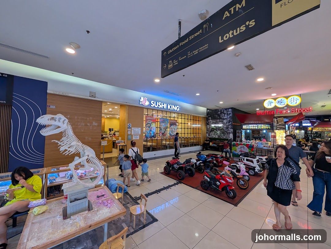 Mall Interior with Sushi King and Dinosaur Skeleton