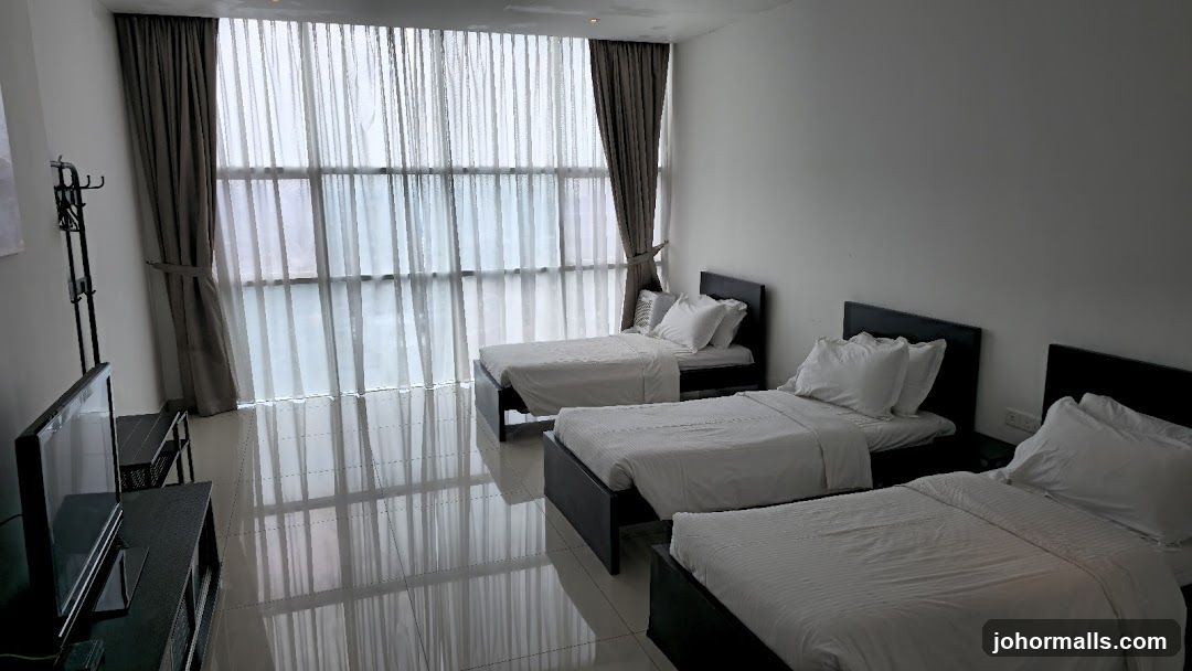 Bedroom with three beds